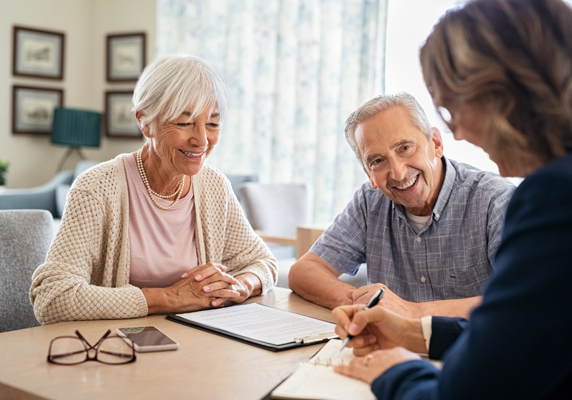 A couple reviewing their Medicare options together
